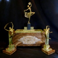 Art Deco marble and bronze three piece clock garniture, Lorenzl. Hammer: £1,800