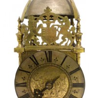                       An early brass lantern clock  Hammer:£16,000